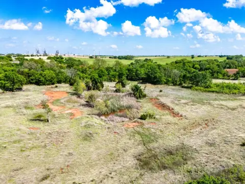 Fenced Farmland Tract with Pond