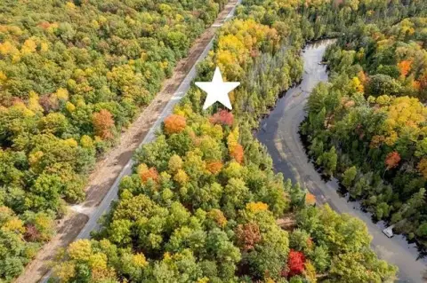 Wooded Rapid Riverfront Land