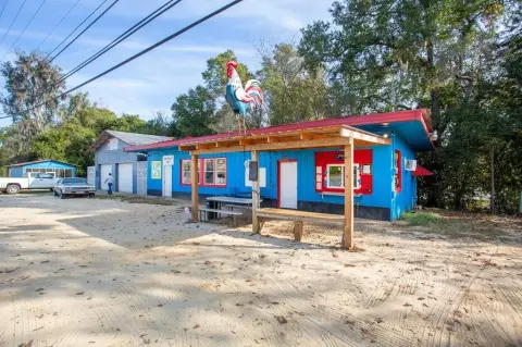 Restaurant with Vehicle Lift Garage