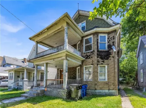 Renovation-Ready Triplex with Basement