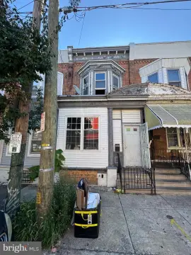 Three-Unit Masonry Multifamily Property