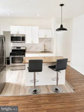 Renovated Four-Unit Masonry Quadplex
