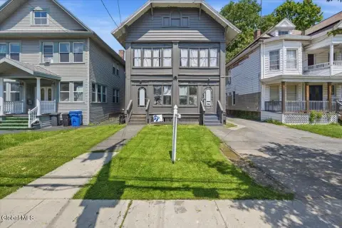 Residential Income Property with Sunroom