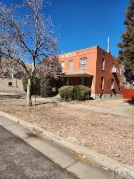 Pueblo Multifamily Property with Garages