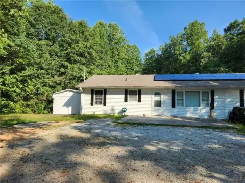 Income-Producing Triplex on Large Lot