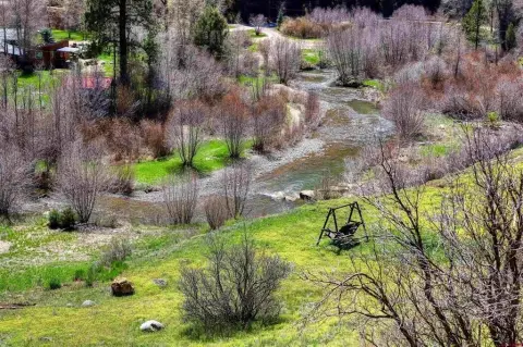 Riverfront Land with Two Domiciles