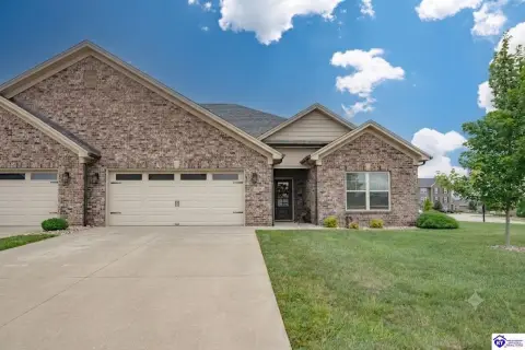 Brick Duplex Home with Vaulted Ceilings