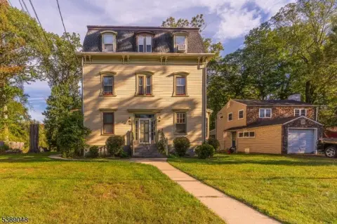 Spacious Three-Family Home, Large Backyard