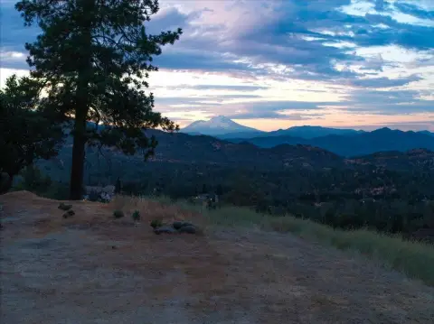 Land with City and Mountain Views
