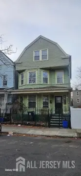 Updated Newark Two-Family Residence