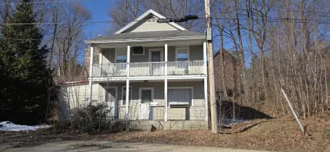 Triplex Property Requiring Demolition