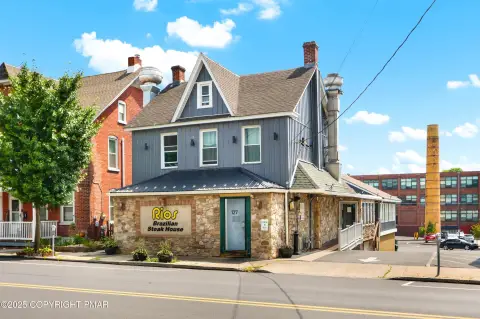 Multi-Use Restaurant Building with Apartment