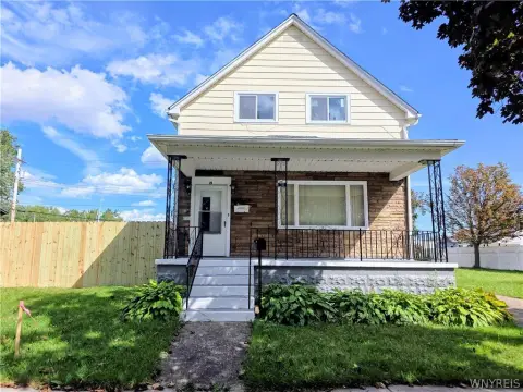 Duplex With Three-Car Garage
