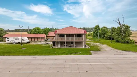 Commercial Land with Existing Buildings