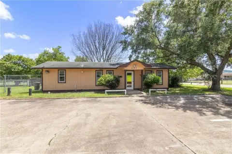 Corner Retail Lot with Small Building