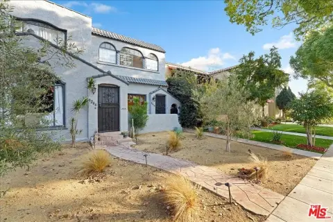 Spanish-Style Duplex with Garden Flat