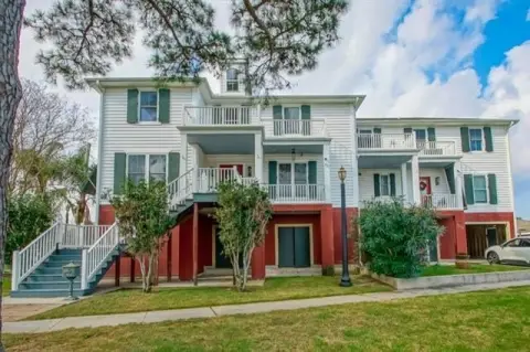 Elevated Two-Story Duplex with Private Apartment
