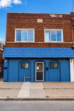 Brick Triplex with Storefront