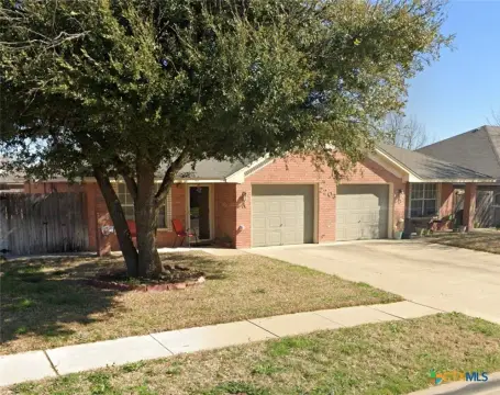 Occupied Duplex with Brick Exterior