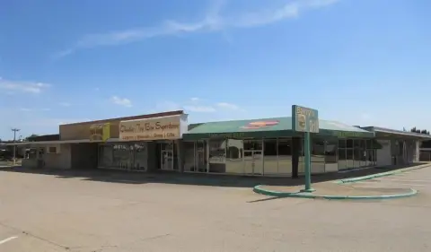 Neighborhood Shopping Center with Vacant Land