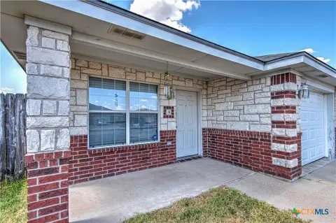 Brick Duplex with Private Garages