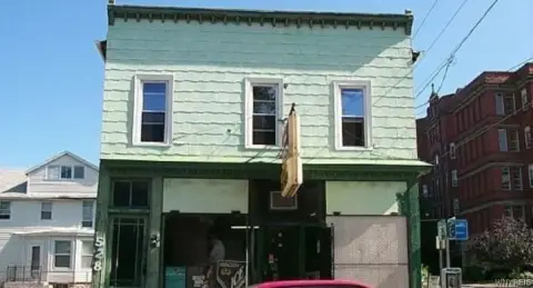 Mixed-Use Property with Vacant Lot