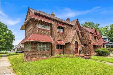 Updated Brick Duplex with Sunrooms