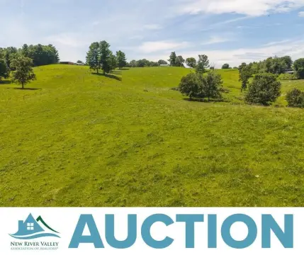 Fenced Agricultural Land with Barn