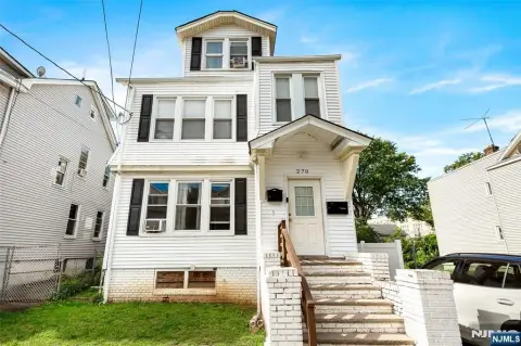 Two-Unit Duplex with Garage