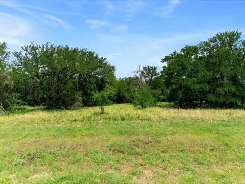 Heavily Treed Corner Acreage