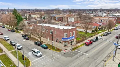 Triplex with Corner Storefront