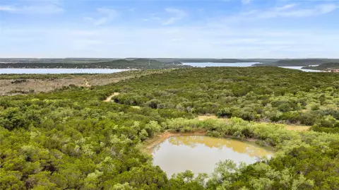 Wooded Ranchland with Lake Views