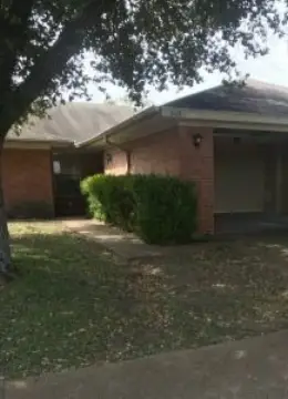 Brick Duplex with Attached Garages