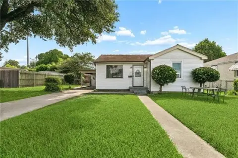 Cottage-Style Duplex with Carport
