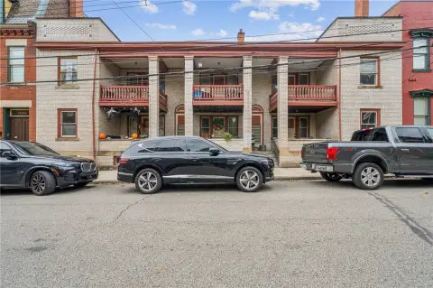 Updated Three-Unit Rowhouse