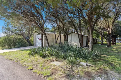 Land with Cabin and Outbuilding
