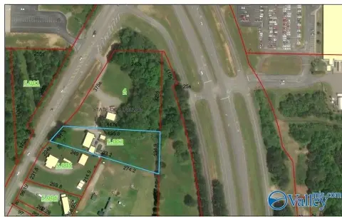 Commercial Land with Existing Improvement