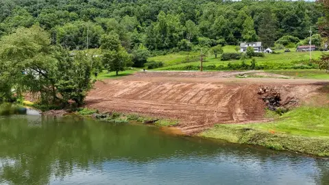 Cleared Riverfront Homesite