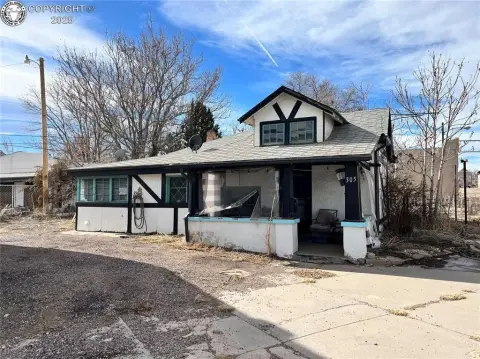 Mixed-Use Corner Property with Garage