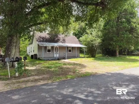 Storefront Property with Existing Cottage