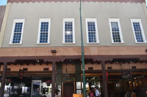 Second-Floor Retail Space with Exposed Beams