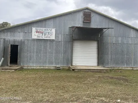 Open Warehouse with Roll-Up Door