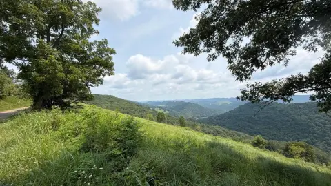 Unrestricted Mountain Recreation Land with River Access