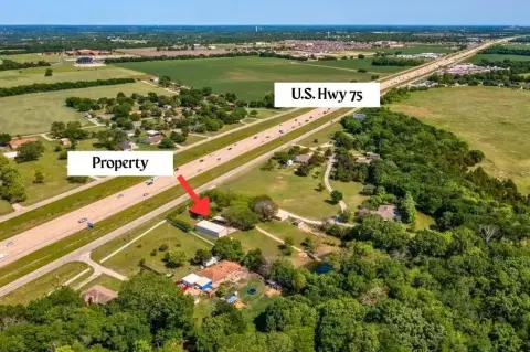 Land with Highway Frontage Residence