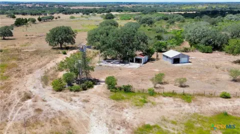 Fenced Agricultural Land with Pond