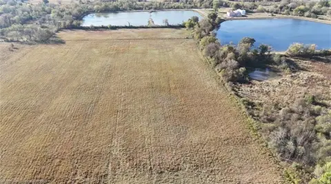 Fenced Farmland with Livestock Improvements