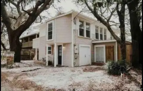 Upper-Lower Duplex with Carport