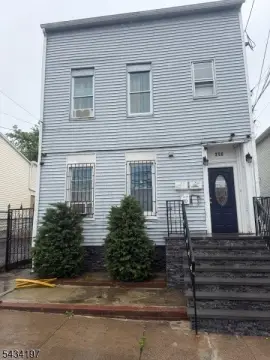 Three-Story Triplex with Renovated Attic
