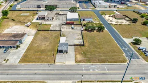 Commercial Land with Existing Improvements