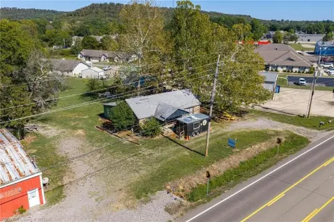 Commercial Land with Existing Buildings
